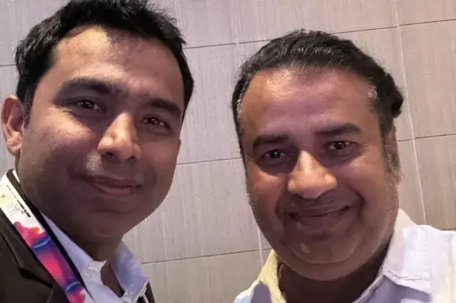Chirag Arora with a colleague at an industry event