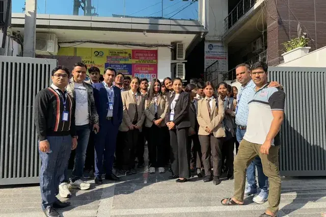 Chirag Arora with students outside a digital marketing training center